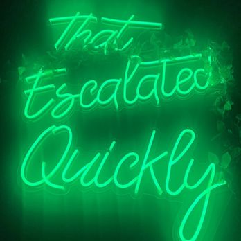 The Pub - a neon sign that says that it is absolutely quickly - Irish Pub Near Me - Austin, Texas