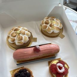 Lemon tarts, raspberry eclairs, mini berry tarts