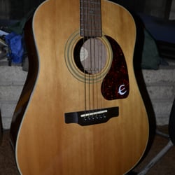 Mustang Jewelry & Pawn - Epiphone PR 350S; one small crack on top, nothin' to worry about, just a "battle scar".