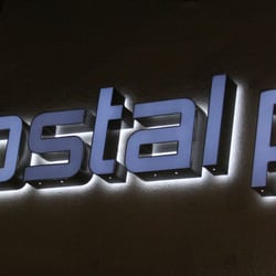 Go Postal Plus - Our Store Sign at Night!