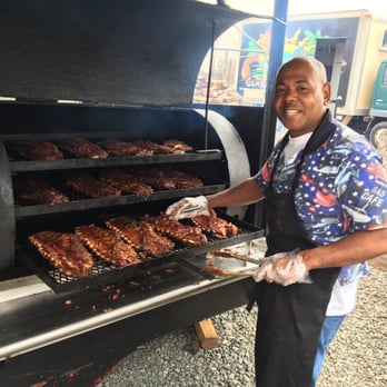Jule's BBQ - Jules perfecting those smoky ribs. Smelled so good standing there! - Barbeque Near Me - Leesburg, Virginia Jule's BBQ - Jules perfecting those smoky ribs. Smelled so good standing there! - Barbeque Near Me - Leesburg, Virginia