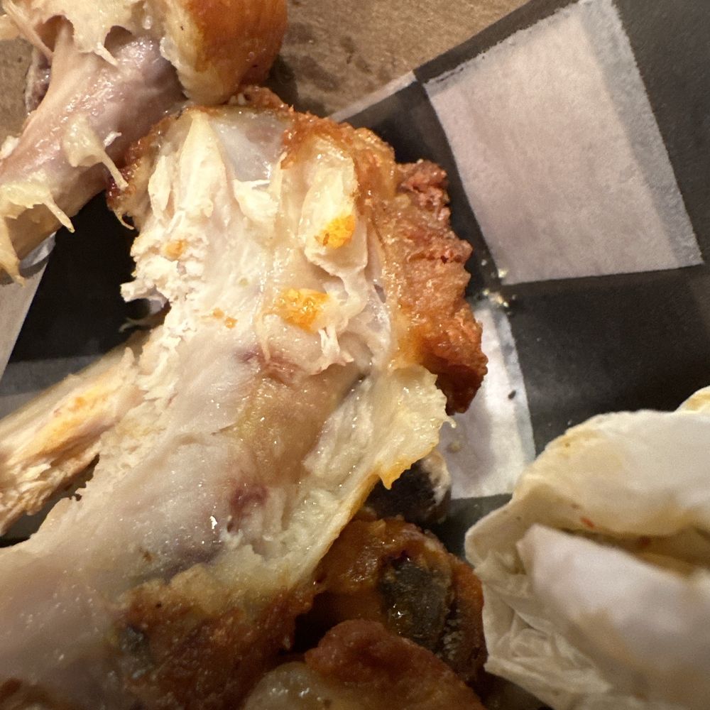 You can see in the middle of the drummie, undercooked chicken.