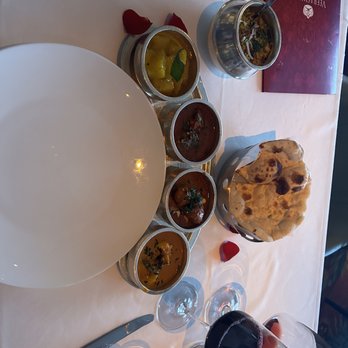 Veeraswamy - This was the curry. Lobster was amazing! The chicken was tender and delicious and lamb was just as amazing. The pineapple was okay. - Indian Near Me - London, XGL
