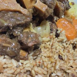 Sun Splash Jamaican Restaurant - Oxtails, rice and peas, steamed veggies