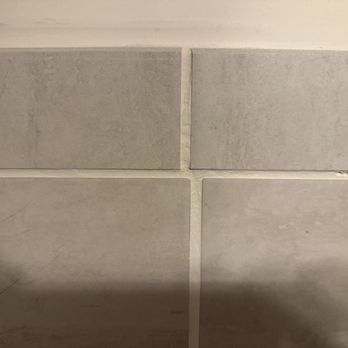 Brenneman Restoration - grout lines don't line up - General Contractors Near Me