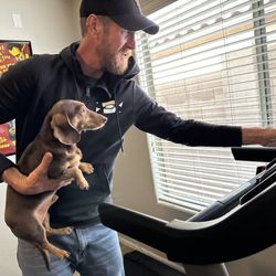 The Assembly Guy - Randy and my daughter's doxie :) - he's not a treadmill fan!