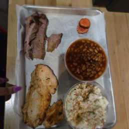 Brisket, smoked Turkey, baked beans (no pork) and cole slaw Brisket, smoked Turkey, baked beans (no pork) and cole slaw