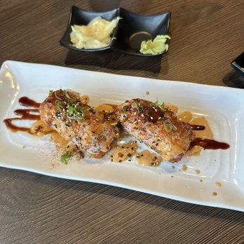 Sugoi Sushi - Sugoi special crispy salmon tempura and crabmeat served over sushi rice topped with spicy mayo eel sauce and lightly seared - Sushi Bars Near Me - Yucaipa, California Sugoi Sushi - Sugoi special crispy salmon tempura and crabmeat served over sushi rice topped with spicy mayo eel sauce and lightly seared - Sushi Bars Near Me - Yucaipa, California