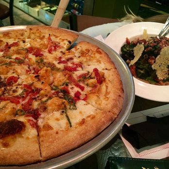Pesto's - Shrimp scampi pizza and grilled broccoli Caesar salad - Pizza Near Me - Chandler, Arizona
