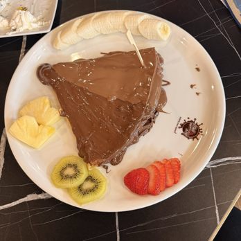 Melt n Dip - Nutella & milk Belgian chocolate crepe - Desserts Near Me - Anaheim, California Melt n Dip - Nutella & milk Belgian chocolate crepe - Desserts Near Me - Anaheim, California