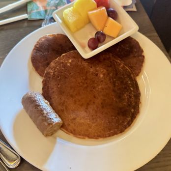 Kona Cafe - Kids Mickey-shaped Allergy-Friendly Pancakes w/ fruit and Plant-based Sausage $9.50 - Sushi Bars Near Me - Lake Buena Vista, Florida Kona Cafe - Kids Mickey-shaped Allergy-Friendly Pancakes w/ fruit and Plant-based Sausage $9.50 - Sushi Bars Near Me - Lake Buena Vista, Florida