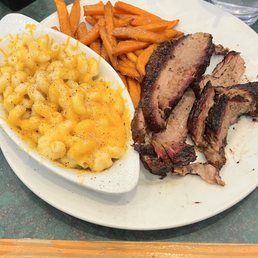 Brisket with Mac n cheese and sweet potato fries Brisket with Mac n cheese and sweet potato fries