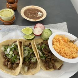 La Jarochita - Taco's Carne Asada! Side of rice & side of refried beans.
