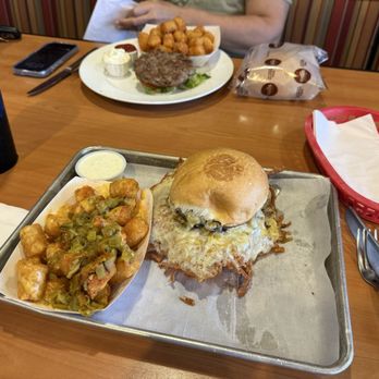 Fuego Burger - This is a Fuego Burger with Green Chili Tots. My associate has gluten and dairy allergies and the staff did NOT miss the mark on her food! - Burgers Near Me - Fort Worth, Texas Fuego Burger - This is a Fuego Burger with Green Chili Tots. My associate has gluten and dairy allergies and the staff did NOT miss the mark on her food! - Burgers Near Me - Fort Worth, Texas
