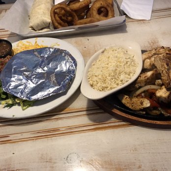 Summer Salts Beach Grill - Chicken Fajitas in the front and buffalo chicken wrap in the back - Bars Near Me - Bethany Beach, Delaware Summer Salts Beach Grill - Chicken Fajitas in the front and buffalo chicken wrap in the back - Bars Near Me - Bethany Beach, Delaware