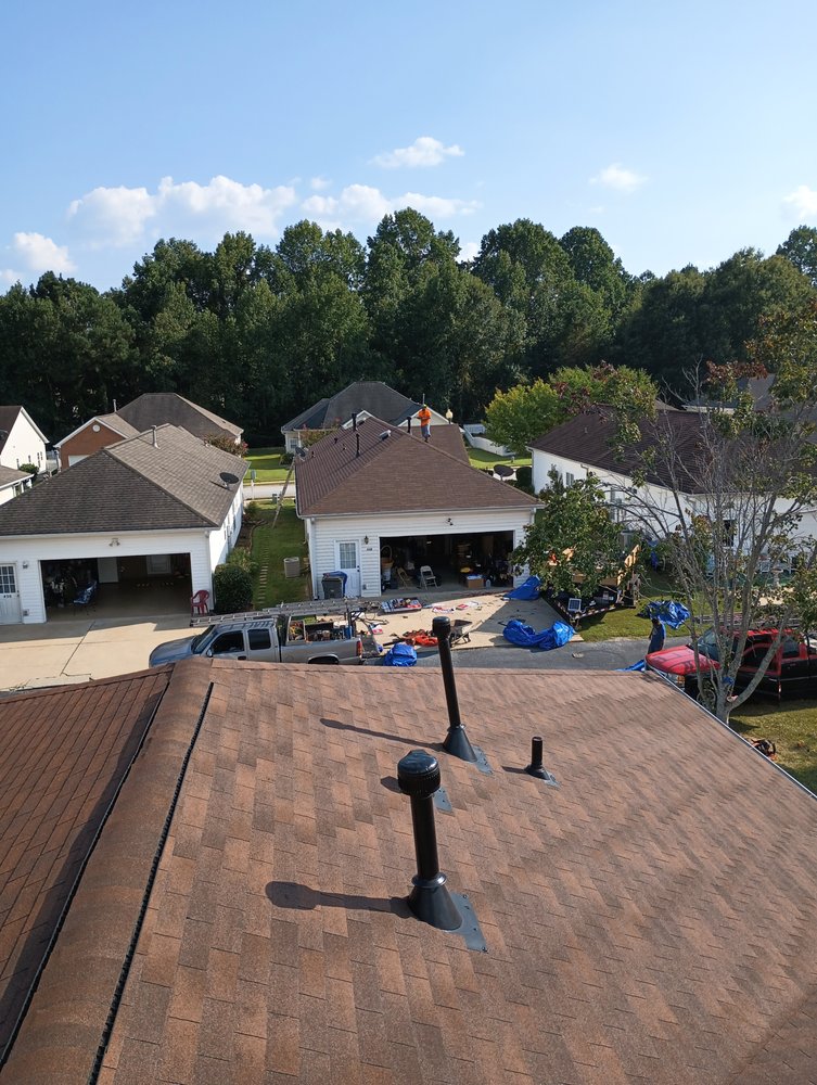 Slide of T & R Roofing