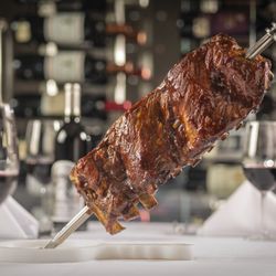 Churrasco Brazilian Steakhouse - Palm Springs - Juicy pork ribs - just one of 16 different all-you-can-eat meats at Churrasco Palm Springs