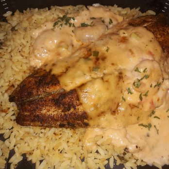 Shrimp Basket - Blackened Redfishon rice cover in a seafood sauce - Seafood Near Me - Pensacola, Florida