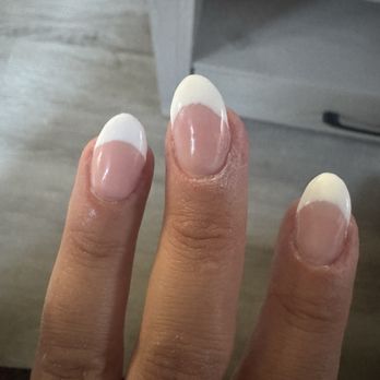 Adore Nail Spa - Uneven French. She didn't even clean it up well you can see the white streaks. - Nail Salons Near Me - Phoenix, Arizona
