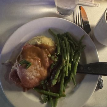 Alhambra Theatre & Dining - Pork steak - Performing Arts Near Me - Jacksonville, Florida