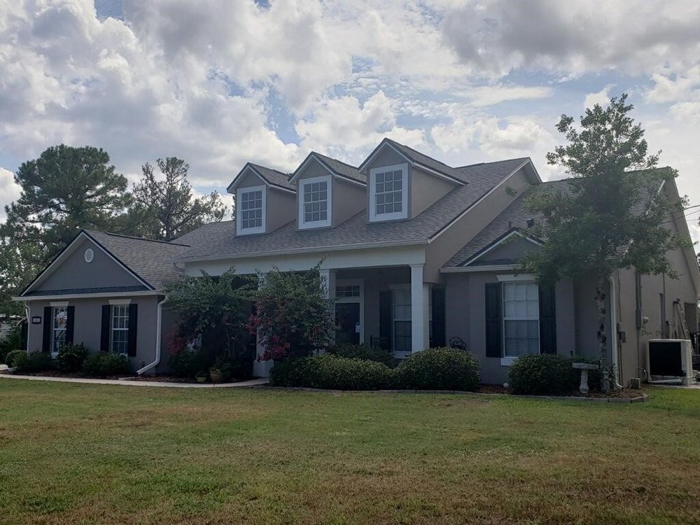 Slide of SG Roofing and Restoration