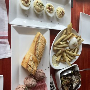 Salty Sow - Deviled eggs, duck fat fries, crispy Brussels sprouts, chicken liver mousse - American Near Me - Austin, Texas Salty Sow - Deviled eggs, duck fat fries, crispy Brussels sprouts, chicken liver mousse - American Near Me - Austin, Texas