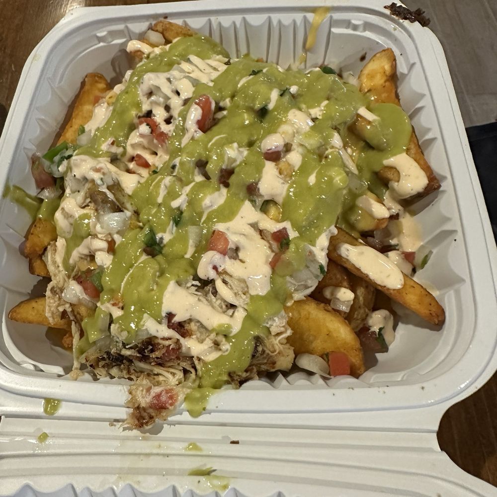 White chicken nachos fries style! White chicken nachos fries style!