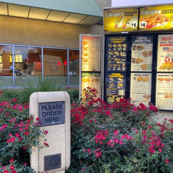 Del Taco - a sign in front of a restaurant - Fast Food Near Me - Tulare, California Del Taco - a sign in front of a restaurant - Fast Food Near Me - Tulare, California