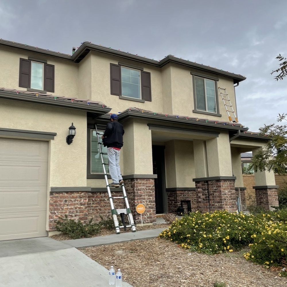 Pacific Solar Care - Ryan installing the lights with clips - Solar Panel Cleaning Near Me Pacific Solar Care - Ryan installing the lights with clips - Solar Panel Cleaning Near Me