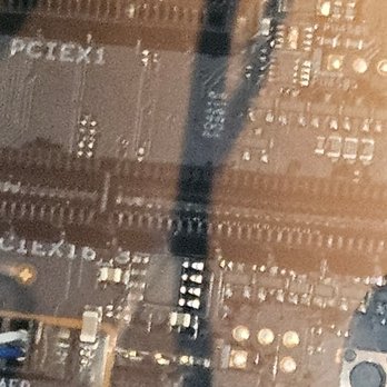 LexIT Systems - A motherboard closeup. - Mobile Phone Repair Near Me
