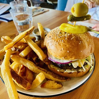 Half Shell - 8oz Burger - Bars Near Me - Seattle, Washington Half Shell - 8oz Burger - Bars Near Me - Seattle, Washington