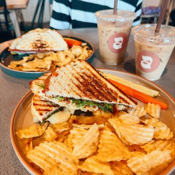 Abode Coffee - Brie Grilled Cheese (front), Italian (back), small iced Americano and the seasonal Caramelized Banana Latte - Coffee & Tea Near Me - Wildomar, California
