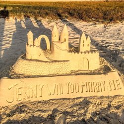 The Sand Lovers - Engagement sand castle