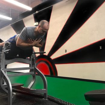 Next Level Rising - Next Level Client working out in a personal training session - Trainers Near Me - Lawrence, Kansas Next Level Rising - Next Level Client working out in a personal training session - Trainers Near Me - Lawrence, Kansas