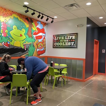 Jeremiah's Italian Ice - two people sitting at a table - Ice Cream & Frozen Yogurt Near Me - Wake Forest, North Carolina Jeremiah's Italian Ice - two people sitting at a table - Ice Cream & Frozen Yogurt Near Me - Wake Forest, North Carolina