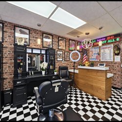 Nelson Barber and Salon - INSIDE BESIDE CASHIER " NELSON BARBER & SALON "