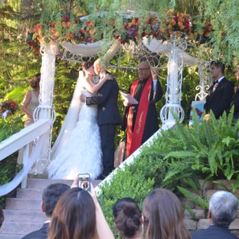 The Vineyards - The elevated ceremony area, with a romantic wedding arch with a chandelier beneath trees! The perfect setting to share vows! - Venues & Event Spaces Near Me - Simi Valley, California The Vineyards - The elevated ceremony area, with a romantic wedding arch with a chandelier beneath trees! The perfect setting to share vows! - Venues & Event Spaces Near Me - Simi Valley, California