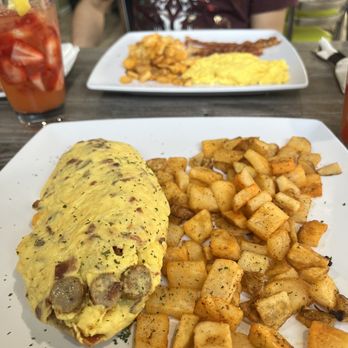 Rosemary Cafe - cheese omelet with sausage and a side of potatoes - Cafes Near Me - Joliet, Illinois