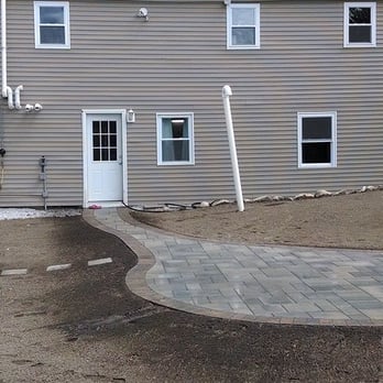 Elite Landscaping - a patio being installed - Landscaping Near Me