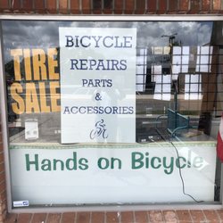 Hands on Bicycle - Front of store (Store Front)!