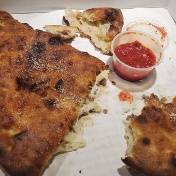 Pedroso's Pizza - This calzone is enormous and packed with cheese and your choice of meat or vegetables. Meatballs can never be a bad choice! - Pizza Near Me - Austin, Texas Pedroso's Pizza - This calzone is enormous and packed with cheese and your choice of meat or vegetables. Meatballs can never be a bad choice! - Pizza Near Me - Austin, Texas