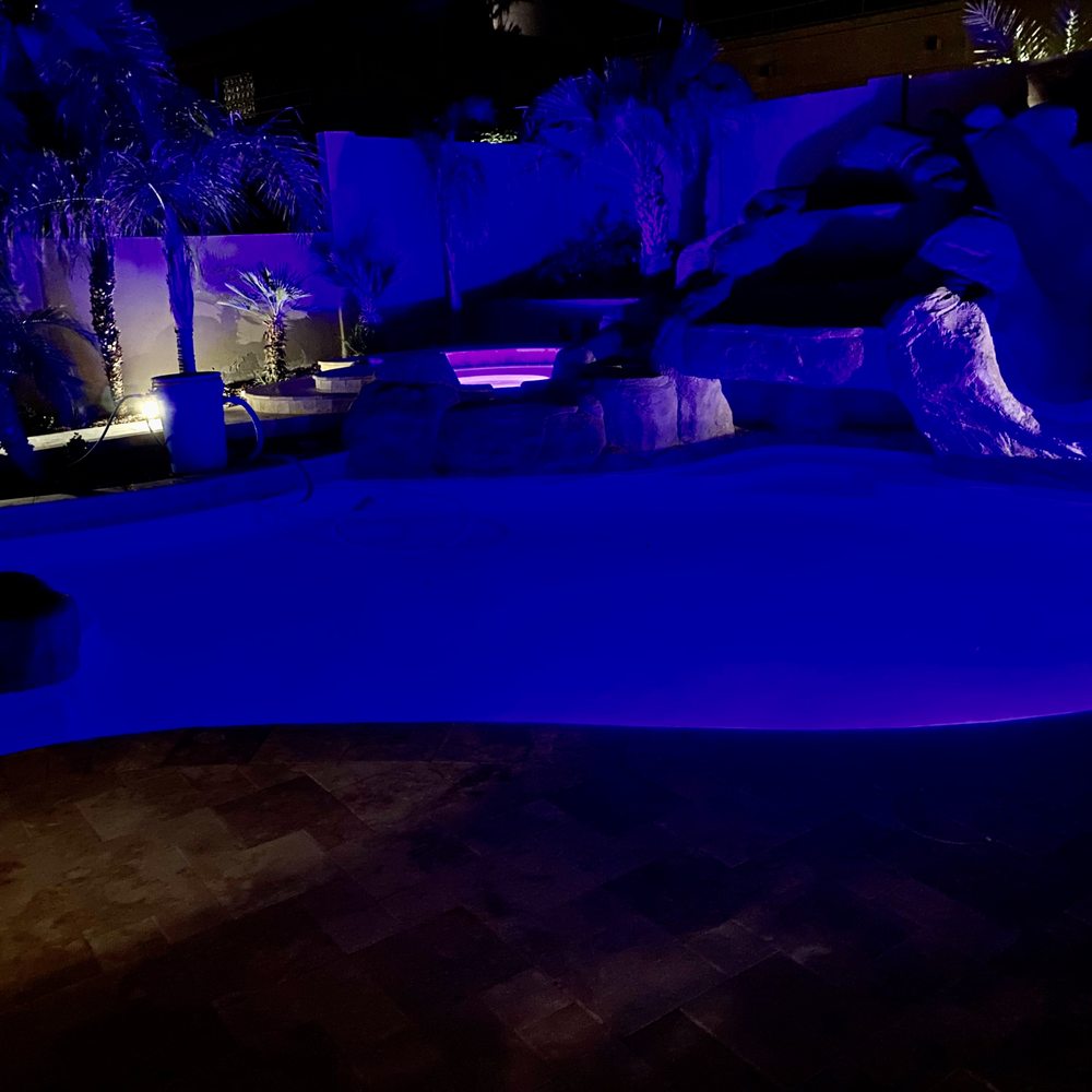 Barefoot Pools - During the fill.  Note the bucket adding just the right chemistry to the water.  Easy startup. - Pool Cleaners Near Me - Gilbert, Arizona