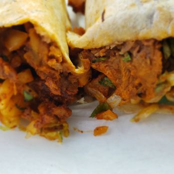 Machos Tacos - The Al pastor burrito first view - Mexican Near Me - Greenfield, Wisconsin