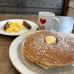 Pancake Stack combo (added eggs and meat). There are 3 cakes in the stack.