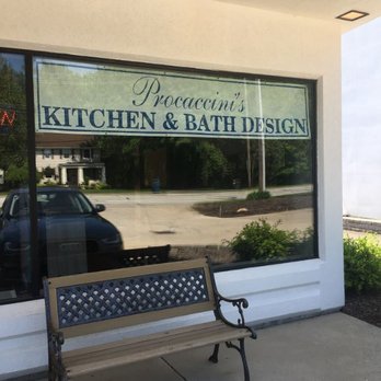 Flooring Concepts - a bench in front of a kitchen and bath design store - Flooring Near Me - North Olmsted, Ohio Flooring Concepts - a bench in front of a kitchen and bath design store - Flooring Near Me - North Olmsted, Ohio