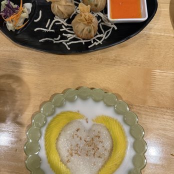 Thai Ivory Cuisine - Mango sticky rice and my half eaten money bags - Thai Near Me - Upland, California Thai Ivory Cuisine - Mango sticky rice and my half eaten money bags - Thai Near Me - Upland, California