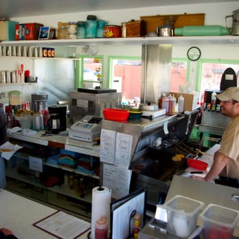Milt's Stop & Eat - View inside. The guy on the left organizes ultramarathons. - Fast Food Near Me - Moab, Utah