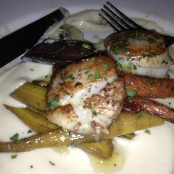 Marjorie - Alaskan Sea Scallops served with Pea Vine, Bacon, Spring Radish, Fava Bean, Lemon Vinaigrette - Burgers Near Me - Seattle, Washington