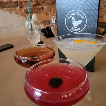 Aqua Terra Bistro - Manhatten martini (far left); pomegranate lemon drop martini; peach blossom martini (far right) - Southern Near Me - Buford, Georgia