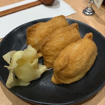 Raku - Inarizushiv (three fried bean curd sushi) - Japanese Near Me - Toronto, Ontario Raku - Inarizushiv (three fried bean curd sushi) - Japanese Near Me - Toronto, Ontario